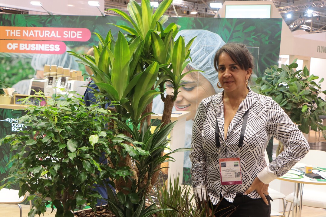 Adriana Bogarin Fonseca from Dracaenas De Altura presents tropical green plants at the Costa Rican stand.