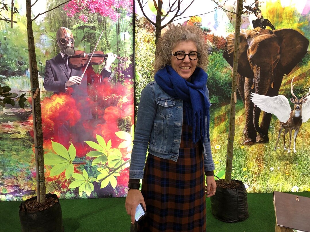 Colorful trees: Janny de Jong at stand 7B29 of Boomkwekerij E. de Jong in front of a poster, because trees are not leafy at this time of year.