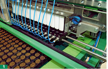 Ellegard-Maschine fr Vliestpfe fr die Jungpflanzen-Anzucht mit dem Einstell-Mechanismus der Tpfe in die Trays.