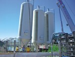 Aufbau von drei Pelletsilos in der Gärtnerei Haag, Heilbronn-Frankenbach, für eine UnterschubfeuerungWerkbild