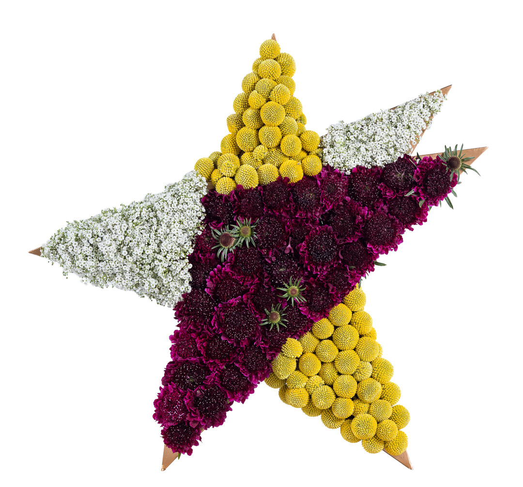 Blumenschmuck in Form des Eurovisions-Logo.