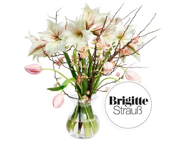 Der Monatsstrau Januar ist aus Hippeastrum, Tulpen und Quittenzweigen gebunden.